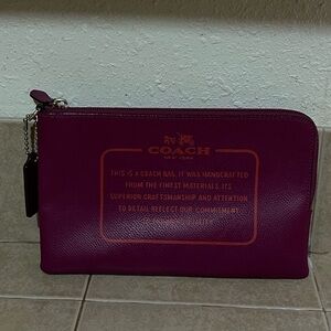 Coach Zip Pouch Clutch in Deep Plum with Orange Logo